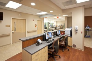 Nurse's station in the Clemmons Emergency and Ambulatory Surgery Center in Clemmons, North Carolina, for Novant Health. Photo courtesy of credit KSQ/Peterson Architects.