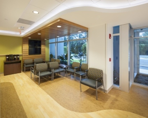 Tallahassee Memorial Hospital Emergency Department, Tallahassee, Florida. Photo Credit: David Anderson. In a facility response to both capital constraints and operational improvements, entrance and waiting spaces are being reduced and may include only half as many waiting chairs as has been the norm.  